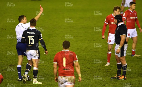 130221 - Scotland v Wales - Guinness Six Nations - Zander Fagerson of Scotland is shown a red card by Referee Matthew Carley