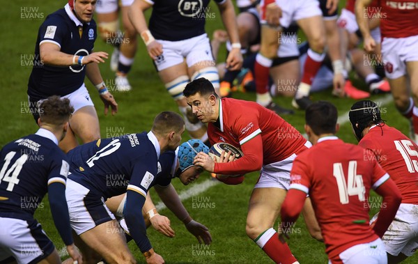 130221 - Scotland v Wales - Guinness Six Nations - Owen Watkin of Wales takes on James Lang of Scotland