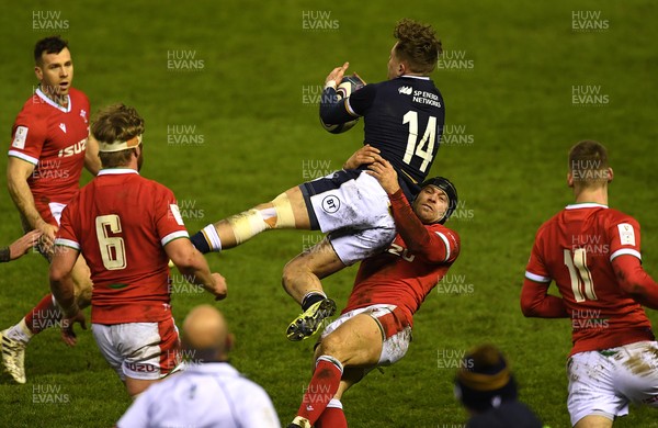 130221 - Scotland v Wales - Guinness Six Nations - Darcy Graham of Scotland and Leigh Halfpenny of Wales collide