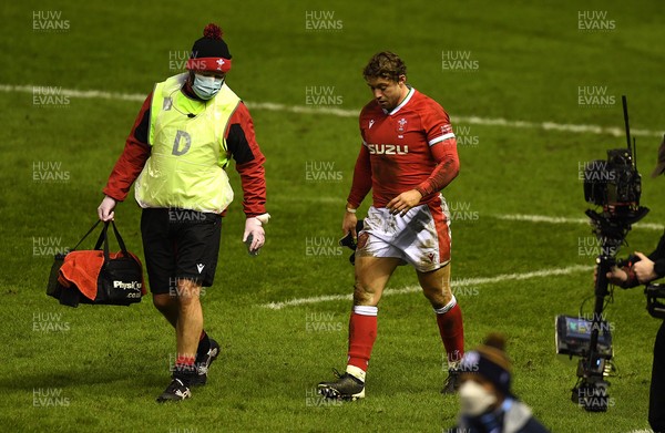 130221 - Scotland v Wales - Guinness Six Nations - Leigh Halfpenny of Wales leaves the field with Dr Geoff Davies
