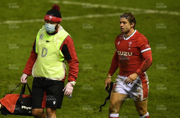 130221 - Scotland v Wales - Guinness Six Nations - Leigh Halfpenny of Wales leaves the field with Dr Geoff Davies