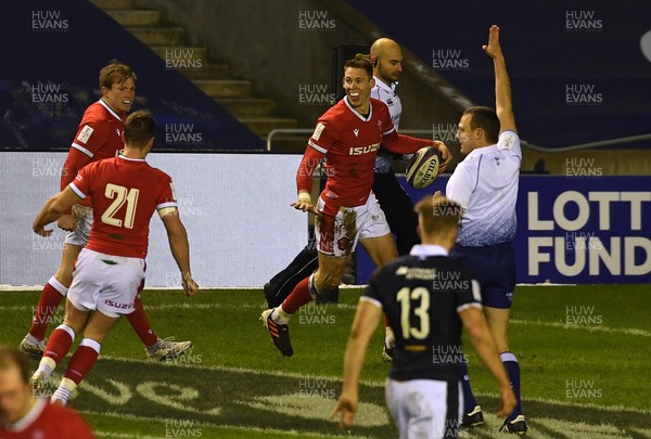 130221 - Scotland v Wales - Guinness Six Nations - Liam Williams of Wales celebrates scoring try with Kieran Hardy