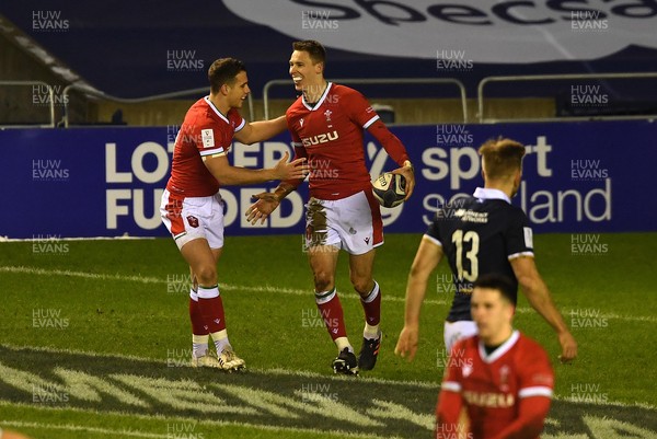 130221 - Scotland v Wales - Guinness Six Nations - Liam Williams of Wales celebrates scoring try with Kieran Hardy