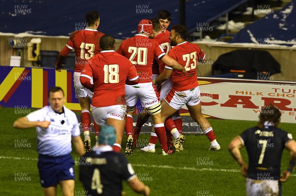 130221 - Scotland v Wales - Guinness Six Nations - Louis Rees-Zammit of Wales celebrates score this second try with team mates