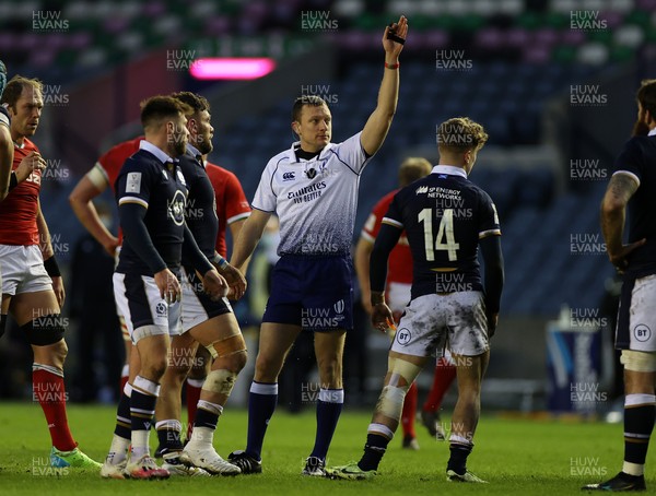130221 - Scotland v Wales - Guinness 6 Nations - Referee Matthew Carley awards Scotland with a penalty