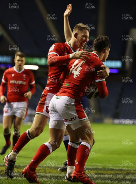 130221 - Scotland v Wales - Guinness 6 Nations - Louis Rees-Zammit of Wales celebrates scoring a try with Liam Williams