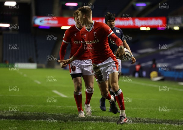 130221 - Scotland v Wales - Guinness 6 Nations - Liam Williams of Wales celebrates scoring a try
