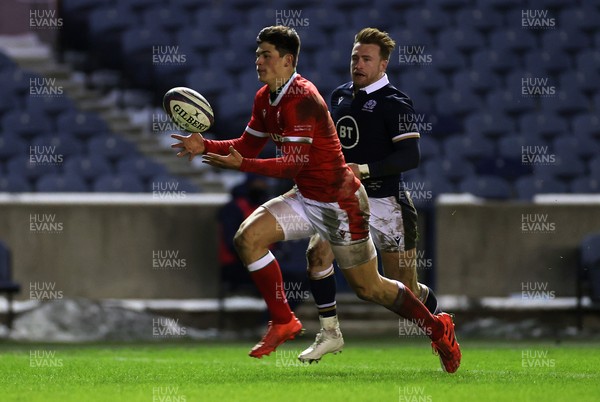 130221 - Scotland v Wales - Guinness 6 Nations - Louis Rees-Zammit of Wales gathers the ball to score a try