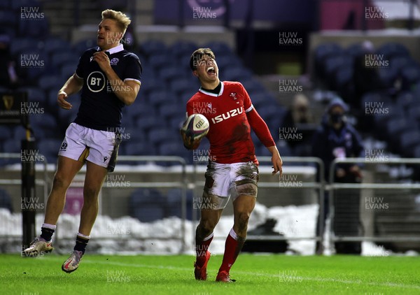 130221 - Scotland v Wales - Guinness 6 Nations - Louis Rees-Zammit of Wales celebrates scoring the game winning try