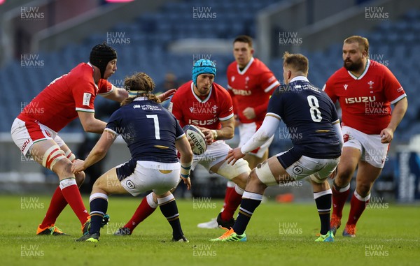 130221 - Scotland v Wales - Guinness 6 Nations - Justin Tipuric of Wales is challenged by Matt Fagerson of Scotland