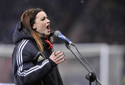 220313 -  Scotland v Wales - 2014 FIFA World Cup Qualifier -  Hampden Park - Scotland - Singer Amy MacDonald sings the National Anthem of Scotland 
