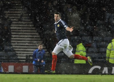 220313 -  Scotland v Wales - 2014 FIFA World Cup Qualifier -  Hampden Park - Scotland - Grant Hanley of Scotland celebrates scoring 