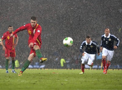 220313 -  Scotland v Wales - 2014 FIFA World Cup Qualifier -  Hampden Park - Scotland - Aaron Ramsey of Wales scores