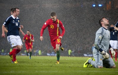 220313 -  Scotland v Wales - 2014 FIFA World Cup Qualifier -  Hampden Park - Scotland - Aaron Ramsey of Wales celebrates scoring