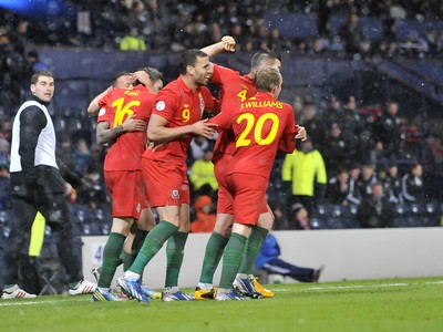 220313 -  Scotland v Wales - 2014 FIFA World Cup Qualifier -  Hampden Park - Scotland - Hal Robson-Kanu of Wales celebrates scoring