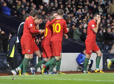 220313 -  Scotland v Wales - 2014 FIFA World Cup Qualifier -  Hampden Park - Scotland - Hal Robson-Kanu of Wales, celebrates after scoring