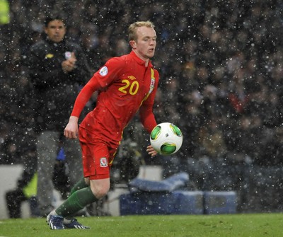 220313 -  Scotland v Wales - 2014 FIFA World Cup Qualifier -  Hampden Park - Scotland - Jonathan Williams of Wales makes his senior debut 