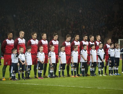 220313 -  Scotland v Wales - 2014 FIFA World Cup Qualifier -  Hampden Park - Scotland - The Wales squad line up before the national anthems