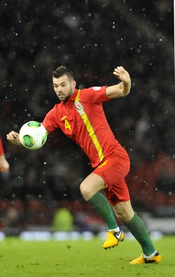 220313 -  Scotland v Wales - 2014 FIFA World Cup Qualifier -  Hampden Park - Scotland - Joe Ledley of Wales 
