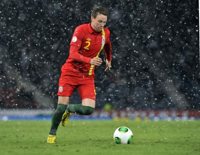 220313 -  Scotland v Wales - 2014 FIFA World Cup Qualifier -  Hampden Park - Scotland - Chris Gunter of Wales 