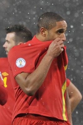 220313 -  Scotland v Wales - 2014 FIFA World Cup Qualifier -  Hampden Park - Scotland - Ashley Williams of Wales 