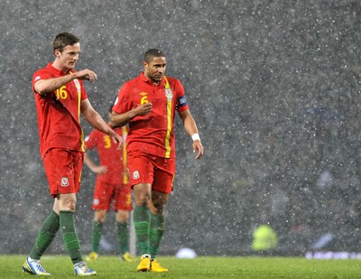 220313 -  Scotland v Wales - 2014 FIFA World Cup Qualifier -  Hampden Park - Scotland - Andy King and Ashley Williams of Wales