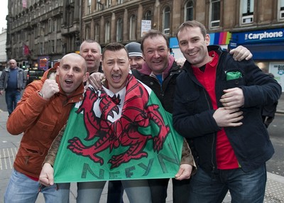 220313 -  Scotland v Wales - 2014 FIFA World Cup Qualifier -  Hampden Park - Scotland - Wales fans pictured in Glasgow city centre 