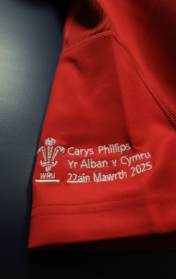 220325  Scotland v Wales, Guinness Women’s Six Nations 2025 - Carys Phillips’ match shirt hangs in the Wales changing room ahead of the match on the occasion of her 80th cap