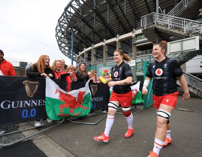 220325  Scotland v Wales, Guinness Women’s Six Nations 2025 - Bethan Lewis of Wales and Kate Williams of Wales make their way to the pitch past Wales fans