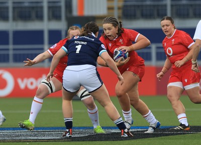 220325  Scotland v Wales, Guinness Women’s Six Nations 2025 - Maisie Davies of Wales takes on Anne Young of Scotland