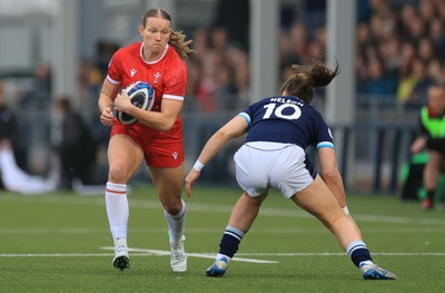 220325  Scotland v Wales, Guinness Women’s Six Nations 2025 - Carys Cox of Wales takes on Helen Nelson of Scotland