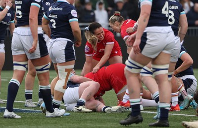 220325  Scotland v Wales, Guinness Women’s Six Nations 2025 - Kayleigh Powell of Wales and Keira Bevan of Wales congratulate Carys Phillips of Wales after she scores try