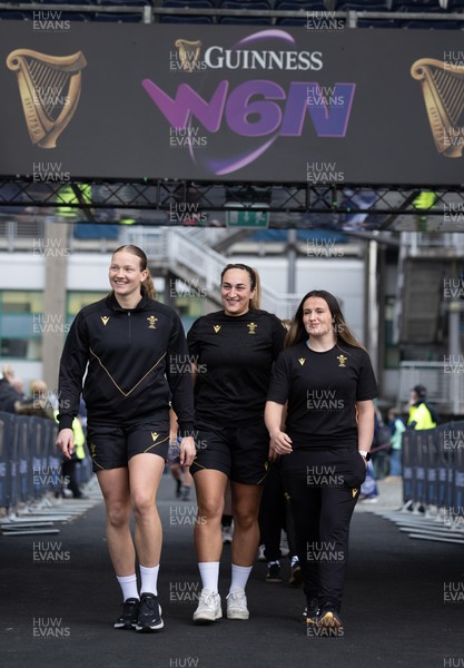 220325  Scotland v Wales, Guinness Women’s Six Nations 2025 - Carys Cox of Wales, Courtney Keight of Wales and Kayleigh Powell of Wales arrive at the stadium