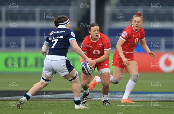 220325  Scotland v Wales, Guinness Women’s Six Nations 2025 - Lleucu George of Wales takes on Rachel McLachlan of Scotland