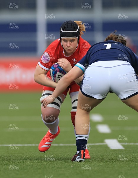 220325  Scotland v Wales, Guinness Women’s Six Nations 2025 - Bethan Lewis of Wales takes on Anne Young of Scotland