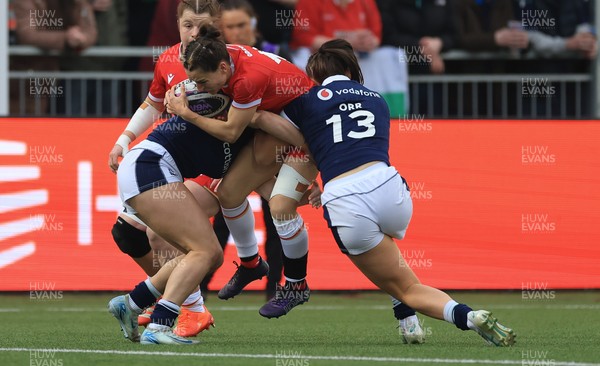 220325  Scotland v Wales, Guinness Women’s Six Nations 2025 - Jasmine Joyce of Wales is tackled