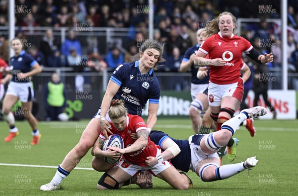 010423 - Scotland v Wales - TikTok Women's Six Nations - Keira Bevan of Wales is tackled by Helen Nelson of Scotland