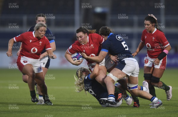 010423 - Scotland v Wales - TikTok Women's Six Nations - Gwenllian Pyrs of Wales is tackled by Louise McMillan of Scotland