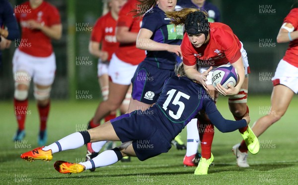 080319 - Scotland Women v Wales Women - Guinness 6 Nations Championship - Bethan Lewis of Wales is tackled by Chloe Rollie of Scotland