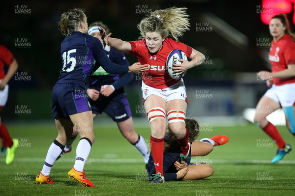 080319 - Scotland Women v Wales Women - Guinness 6 Nations Championship - Alex Callender of Wales is tackled by Chloe Rollie of Scotland