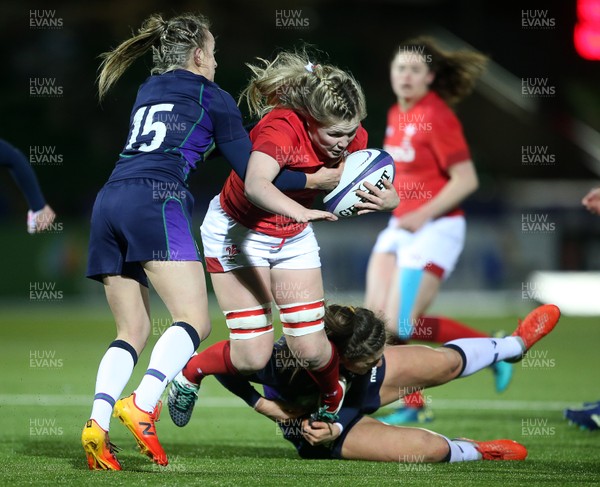 080319 - Scotland Women v Wales Women - Guinness 6 Nations Championship - Alex Callender of Wales is tackled by Chloe Rollie of Scotland