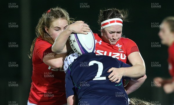 080319 - Scotland Women v Wales Women - Guinness 6 Nations Championship - Mel Clay of Wales is tackled by Lana Skeldon of Scotland