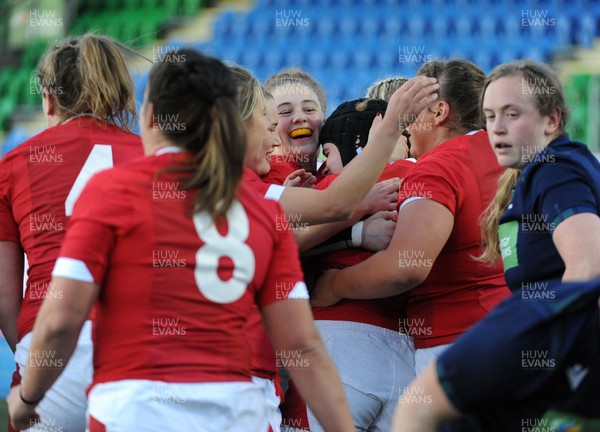 171119 - Scotland Women v Wales Women -  Wales players celebrate a first half try by Bethan Lewis (black headguard)
