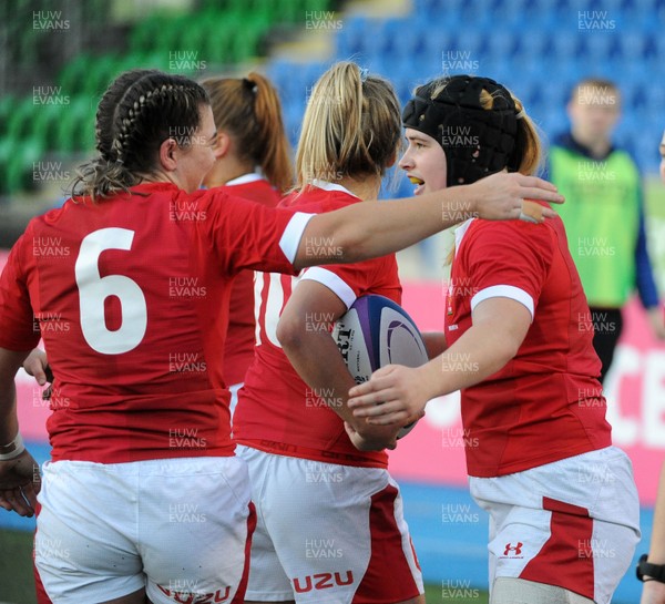 171119 - Scotland Women v Wales Women -  Wales players celebrate a first half try by Bethan Lewis (black headguard)