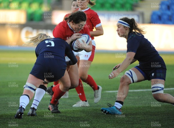171119 - Scotland Women v Wales Women -  Cerys Hale of Wales is tackled by Rachel Malcolm (R) and Sarah Bonar (5)