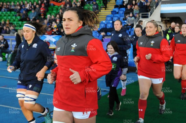 171119 - Scotland Women v Wales Women -  Scotland captain Rachel Malcolm and Wales captain Siwan Lillicrap lead their teams out