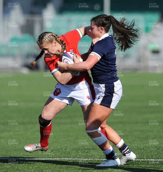 240421 - Scotland Women v Wales Women - Women's Six Nations - Hannah Jones of Wales hands off opposite number Lisa Thomson