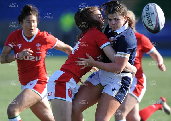 240421 - Scotland Women v Wales Women - Women's Six Nations - Lisa Thomson of Scotland is crash tackled by Wales winger Lisa Neumann (14)
