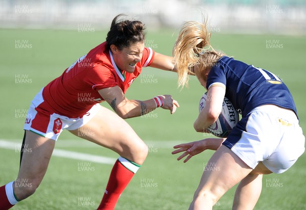 240421 - Scotland Women v Wales Women - Women's Six Nations - Gemma Rowland of Wales gets to grips with Megan Gaffney of Scotland