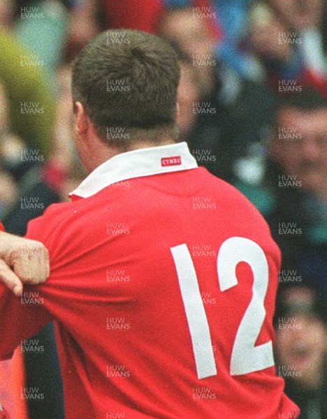 Library pic Wales rugby players. Scott Gibbs(back view)